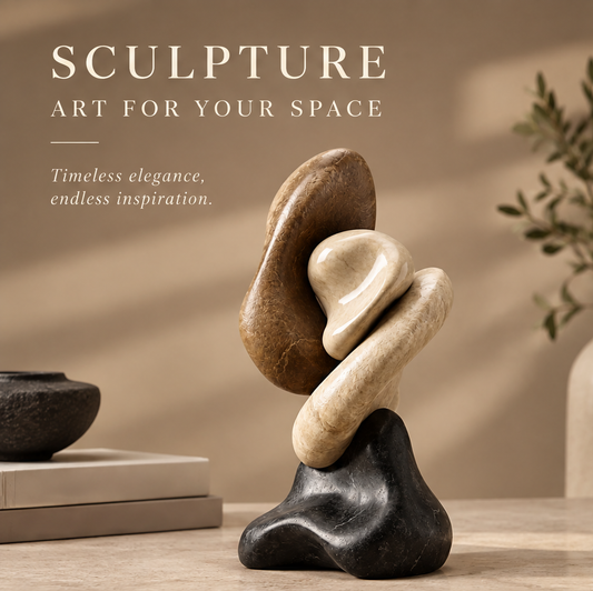 VITALUXO Organic Tri-Stone Abstract Sculpture on a marble surface beside stacked books, black ceramic bowl and olive branch — Sculpture, Art for Your Space, Timeless Elegance, Endless Inspiration